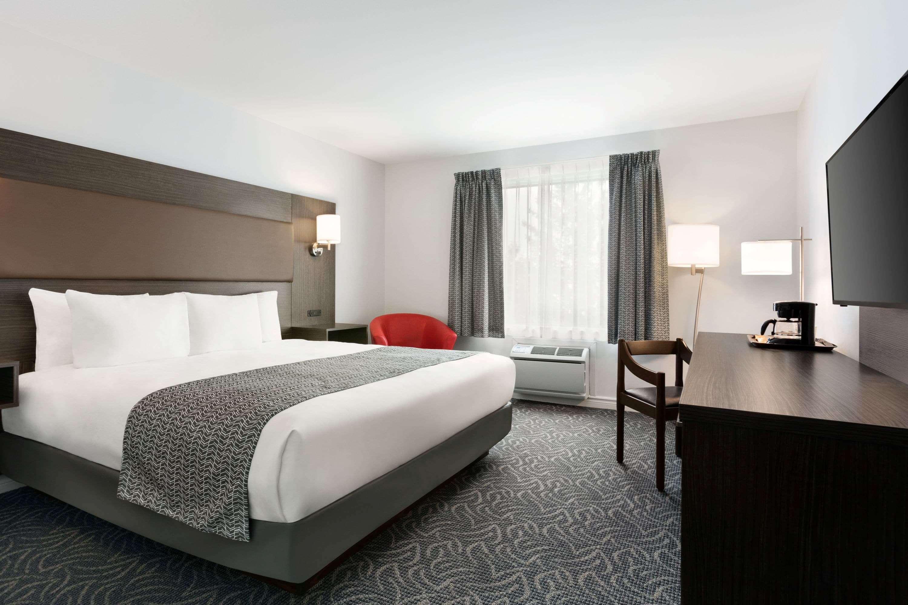 Travelodge By Wyndham Rigaud Экстерьер фото